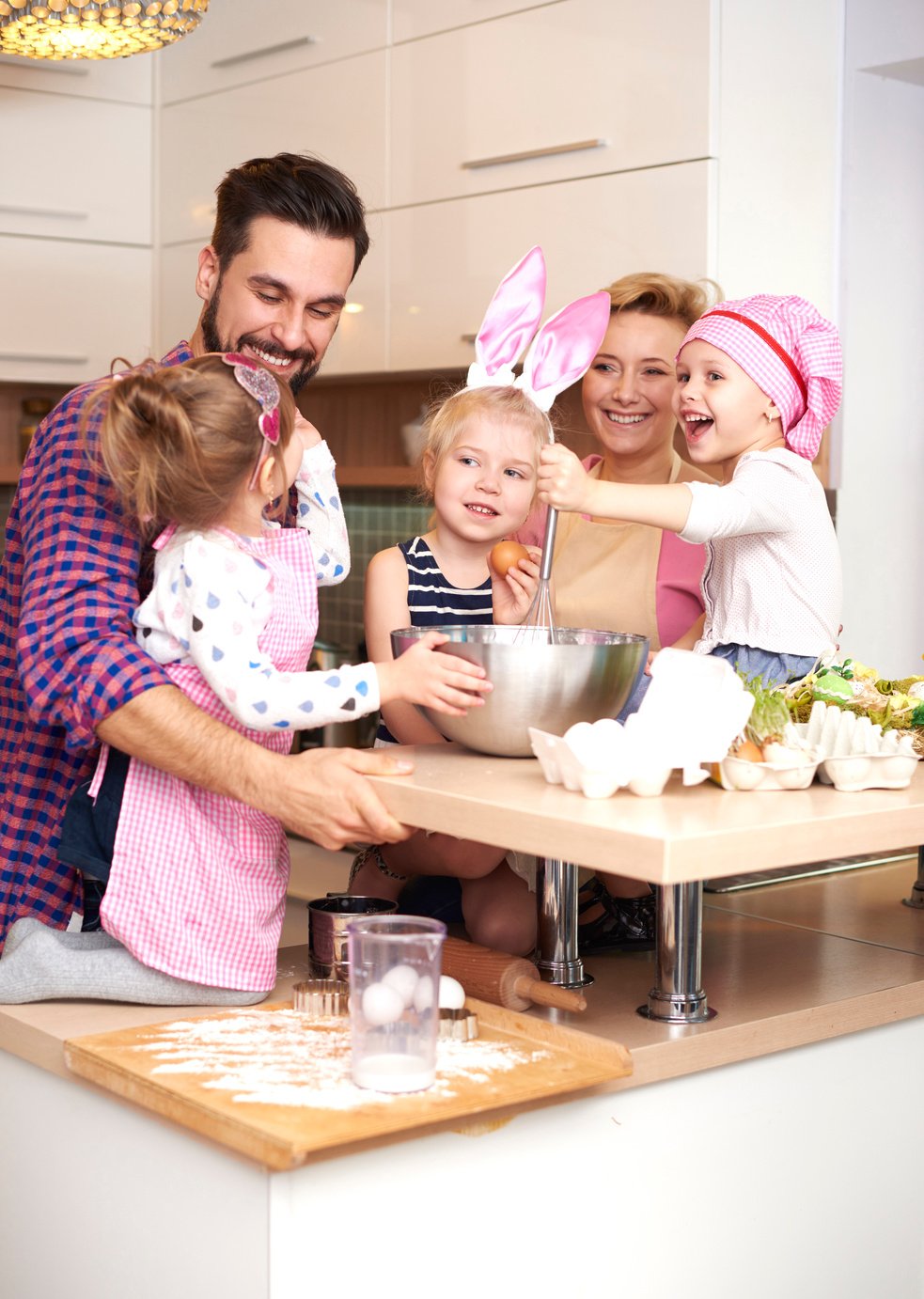 Whole family busy in the kitchen